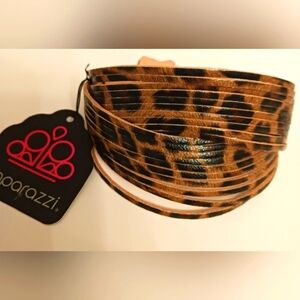 NWT Reversible Faux Leather Bracelet with 2 snap size options.